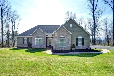 Custom Home on Greenwood Drive — Window Installation & Replacement project by Pella Windows And Doors