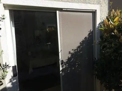 Milgard Sliding Door — Window Installation & Replacement project by The Window And Door Shop, Inc.