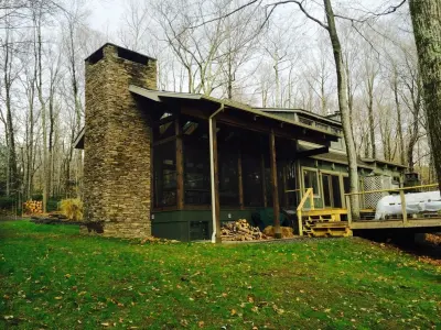 Eze-Breeze Room at the Mountain Cabin — Window Installation & Replacement project by Uneeda Home Improvement Co., Inc