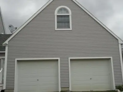 Updated Vinyl Cladding — Window Installation & Replacement project by T.R. Wells Custom Framers, LLC