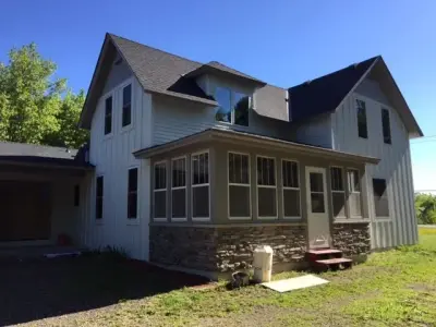 Rogers, MN Vintage Farmhouse — Window Installation & Replacement project by SMA Exteriors & Restoration