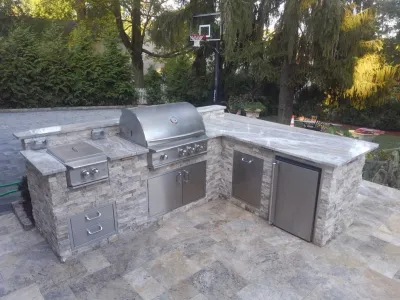 Timeless Travertine Patio with Outdoor KItchen & Fire Pit — Landscape Design project by Outdoor Living Of NJ