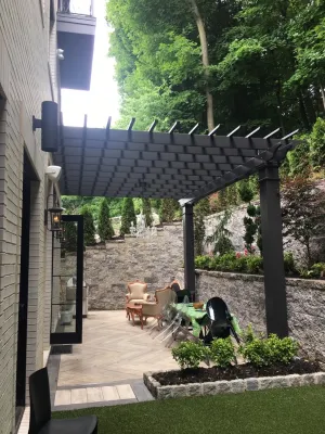 Attached Fiberglass Black Pergola — Landscape Design project by Outdoor Living Of NJ in Edgewater