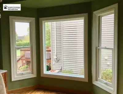 Pella Architect Series Windows with Triple Sliding Door in Wheaton — Window Installation & Replacement project by Schmidt Exteriors, Inc.