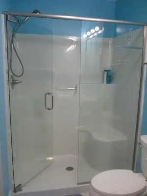 Pivot Hinged Shower Doors — Window Installation & Replacement project by Illinois Valley Glass & Mirror