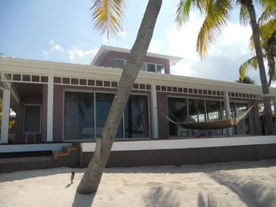 Lavender Mist Home in Grand Cayman — Window Installation & Replacement project by Panda Windows & Doors