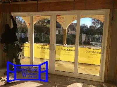 Room Addition with Sliding Glass Doors — Window Installation & Replacement project by Better View Windows And More, LLC