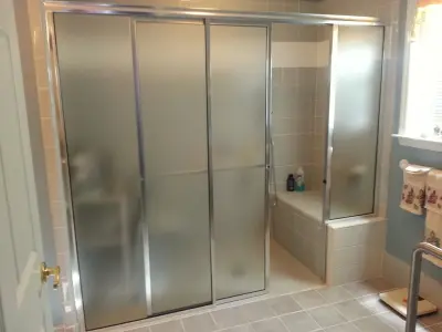 Framed and Frameless Sliding Shower Doors — Window Installation & Replacement project by Convenient Glass Service Inc.
