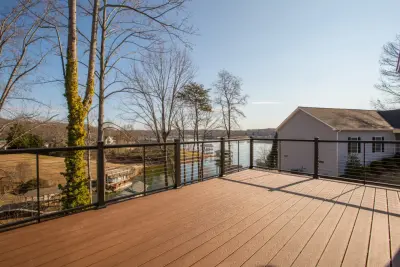 SML Rooftop Trex Deck with Wire Railing — Window Installation & Replacement project by Elegant Exteriors By TBS, LLC