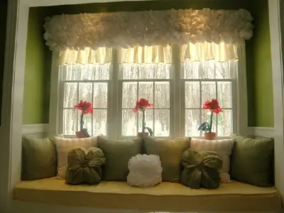 Trio of double-hung windows enhancing a lovely window seat area — Window Installation & Replacement project by Regal Replacement Windows