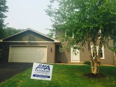 Plymouth, MN Woodpecker Issues — Window Installation & Replacement project by SMA Exteriors & Restoration