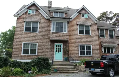 Best Entry in Award-Winning Exterior Renovation — Custom Home Builders project by Woodland Partners Custom Builders