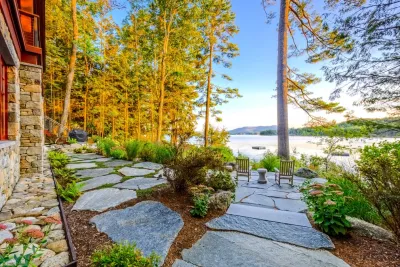 New England Style Lakeside Retreat by Pellettieri Associates, Inc.