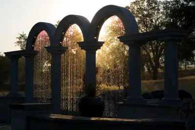Roman Arches — Landscape Design project by Artisan Home Resorts