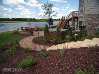 Backyard Pondside Retreat — Landscape Design project by Piala's Nursery & Garden Shop Inc