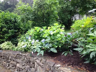 Stone House in Armonk — Landscape Design project by Pierce Hill Design, Ltd.