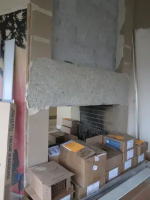 Dual-Faced Frank Lloyd Wright-Inspired Tiled Fireplace — Kitchen Remodeling project by Skyline Remodeling