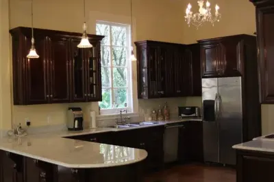 Custom Cherry Cabinetry by Gloss - New Orleans — Kitchen Remodeling project by Delta Cabinets Of New Orleans