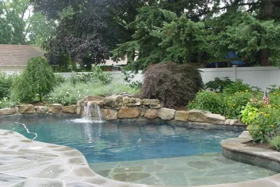 Private Patio and Pool by Artisan Landscapes And Pools