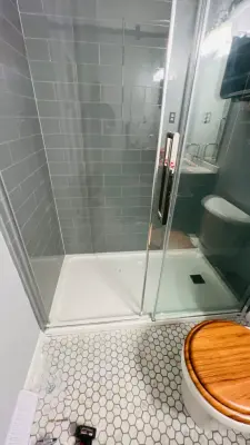 Hulen Drive Hall Bathroom by TigerTown Home Improvement LLC