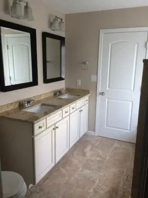 Marble shower with a walk-in design — Kitchen Remodeling project by All Over IT Renovations