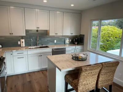 State Street Condominium Kitchen by Castle Construction Of Santa Barbara