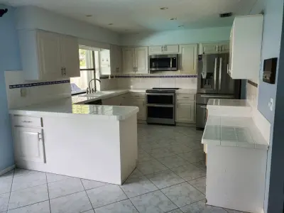 Matte White Transitional Kitchen Renovation — Kitchen Remodeling project by Kitchen Solvers Of Fort Lauderdale