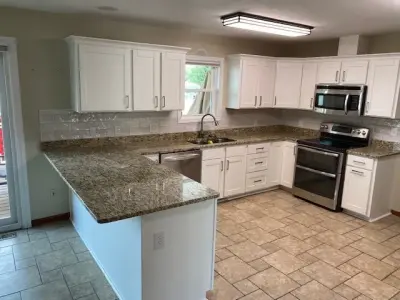 Snow-Colored Transitional Kitchen Renovation — Kitchen Remodeling project by Kitchen Solvers Of Fort Wayne & Toledo