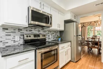 White Lowland Door Transitional Kitchen Renovation — Kitchen Remodeling project by Kitchen Solvers Of Oklahoma City