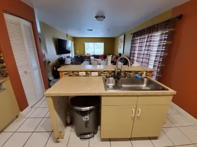 Modern Kitchen Renovation Featuring New White Cabinets — Kitchen Remodeling project by Kitchen Solvers Of Fort Lauderdale