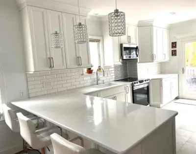 White-on-White Culinary Space — Kitchen Remodeling project by Kings Interior Design