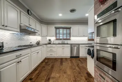 Transitional Monochrome Kitchen — Kitchen Remodeling project by Heritage Renovations