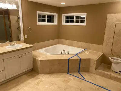 Bathroom renovation with updated stair balusters, new carpeting, refinished hardwood floors, and fresh paint — Home Renovation & Remodeling Services project by Green Phoenix LLC