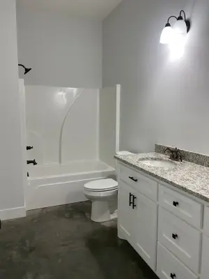 Contemporary Farmhouse Design by Neil Robinson Custom Homes, LLC