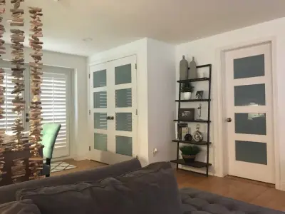 Family Room Entertainment Wall Transformation — Home Renovation & Remodeling Services project by Carrie Cross/Carlton Naumann Homes