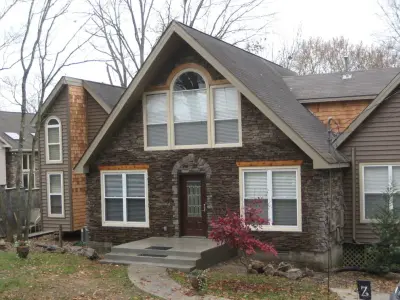 Stone and Cedar Exterior Revamp — Home Renovation & Remodeling Services project by Stratton Exteriors