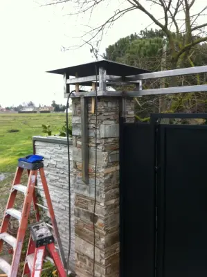 Custom Gate Construction with Elegant Mid-Century Modern Pillars by V-Builders