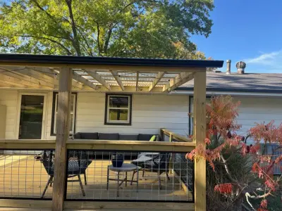 Ground-Level Deck Enclosure in Lake Waukomis, MO — Home Renovation & Remodeling Services project by Elite One, Inc.