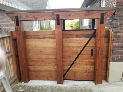 BACKYARD BARN DOOR ENTRANCE — Home Renovation & Remodeling Services project by Preferred Aluminum & Remodeling Inc.