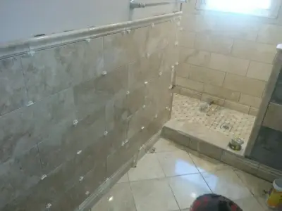 bathroom tile — Home Renovation & Remodeling Services project by Rick DeBerry's Flooring And Remodeling
