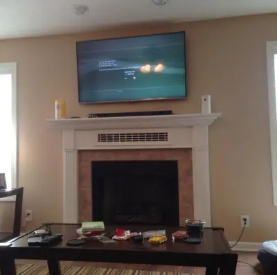 Personalized Electronics Bay for Mantle — Home Renovation & Remodeling Services project by David Wyles Construction LLC