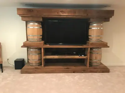 Repurposed barnwood media console by Lank Construction