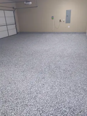 Epoxy Garage Floor Project (Before and After Photos) — Home Renovation & Remodeling Services project by Thunderbird Construction & Restoration LLC