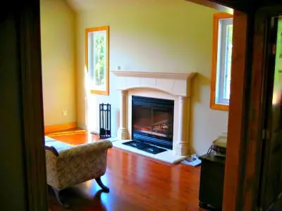 Dorchester County Wooden Fireplace — Home Renovation & Remodeling Services project by Rommel Hearth And Outdoor