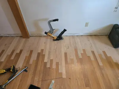 Akron, OH Hardwood Flooring Installation and Remodeling — Home Renovation & Remodeling Services project by Butler Building & Restoration LLC