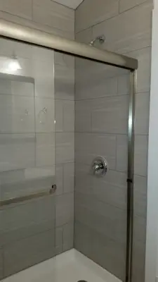 Shades of Grey - Bathroom Renovation — Home Renovation & Remodeling Services project by Aspen Homes Construction