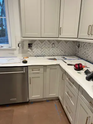 Chevron tile backsplash — Home Renovation & Remodeling Services project by IMG Construction Services