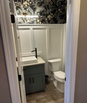 Wainscoting for a compact bathroom — Home Renovation & Remodeling Services project by Lank Construction