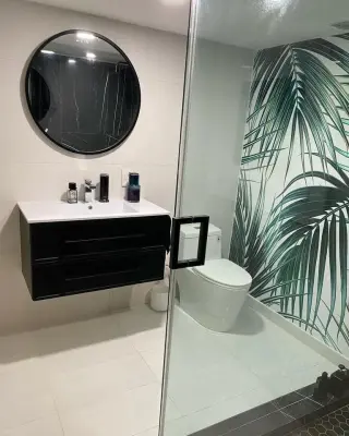 Bathroom Remodel Transformation — Home Renovation & Remodeling Services project by Craftsman Construction