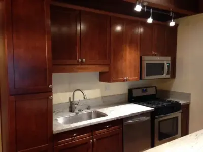 Incline Village condominium kitchen renovation before and after images — Home Renovation & Remodeling Services project by RIEK Builds, Inc.